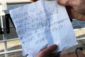 Remembrance: Brian sketches out the words for the piece.