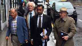 Appeal: Aamer Anwar arrives with Lockerbie campaigners.
