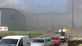Response: The blaze caused large plumes of smoke.