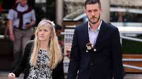 Charlie's parents outside the Royal Courts of Justice in London