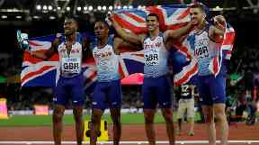 Team GB celebrate their gold at the 4x110m men's relay.