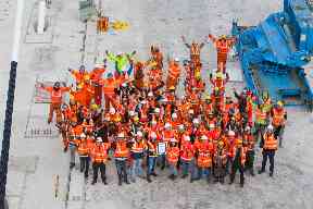 The team celebrate a world record victory.