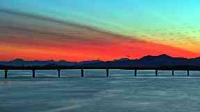 Bridge view: Can you guess the bridges these photographers are standing on?
