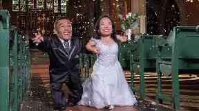 The happy couple have a combined height of just over 70 inches.