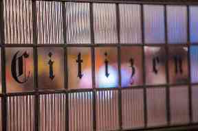 Glass partions have been installed to mimic the former newsroom.