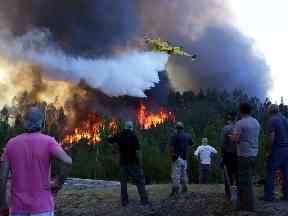 Firefighters have been battling fires like this one in Macao, central Portugal