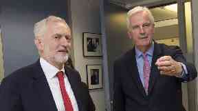 Mr Corbyn, pictured here with chief Brexit negotiator Michel Barnier in July, has arrived in Brussels.