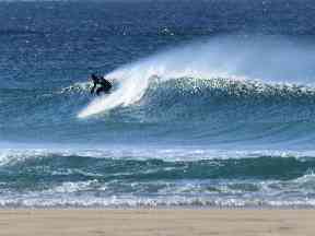 Surfers on Lewis take to the waves.