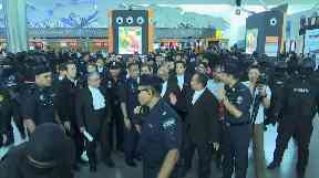 A heavy police presence accompanied the trial parties.