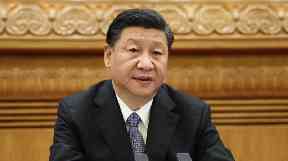 President Xi Jinping's name has been inserted into the Communist Party's constitution.