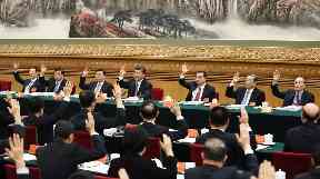 Communist Party members vote at the national congress.