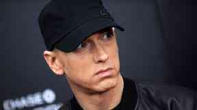 Eminem has won more than £300,000 in damages.