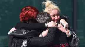 Relatives hug outside the Hillsborough inquests in 2016.