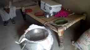A large pot used to make lassi.