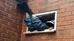 The suspect spent around seven hours stuck in the fan unit.