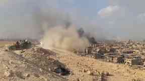 Syrian government troops say they are now in full control of the city.