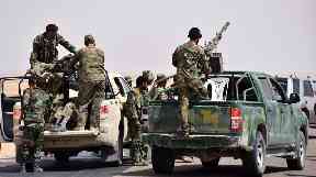 Syrian troops and pro-government gunmen in Deir ex-Zor province.