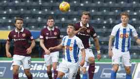 Adam Frizzell takes possession against Hearts