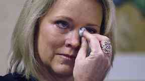 Former Boston news anchor Heather Unruh breaks down at a press conference about the sexual assault of her son.