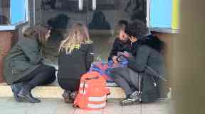 Volunteers check on a homeless person in Hull.