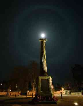A moonbow appears over Nairn's war memorial.