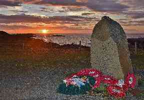 The sunset sets the scene for the memorial at Cove, Wester Ross.