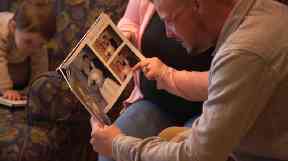 Lilly showed Andy photos of cherished moments with her late husband.