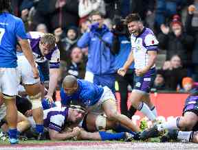 Rugby: Scotland's Stuart McInally celebrates after scoring a try during the Autumn International at