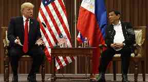 Donald Trump pictured with Philippines President Rodrigo Duterte