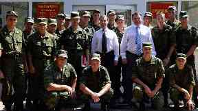 Dmitry Medvedev: Former Russian president meets Abkhaz troops in 2010.