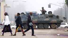 Army troops and armored vehicles remain on the streets of Harare.