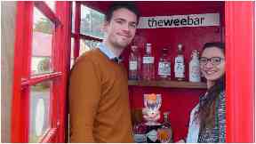 The Wee Bar: Jeremy and Charline Denise inside tiny bar.