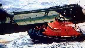 Rescue attempt: Lifeboat alongside the Green Lily.