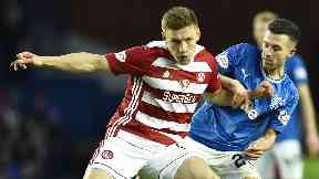 Football: Greg Docherty in action against Rangers in November last year.