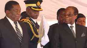 Emmerson Mnangagwa (left) and Robert Mugabe at a gathering in early November