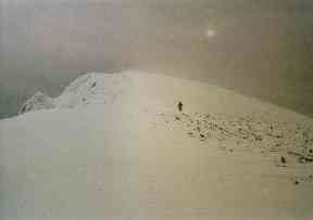 Heavy clouds roll in at Ben Nevis summit.