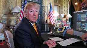 Donald Trump speaks to reports at Mar-a-Lago.