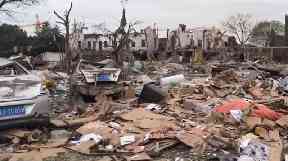 Buildings were destroyed and the streets were littered with debris from the blast.