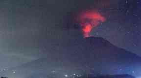 Ash from Mount Agung has been shot into the atmosphere.