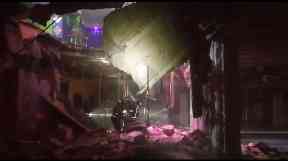 Firefighters work amongst the rubble of the nightclub.