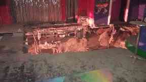 The hole opened up on the nightclub's dancefloor.
