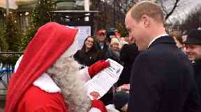 The Duke of Cambridge presented Father Christmas with Prince George's letter.