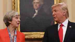 Theresa May and Donald Trump have clashed over the US president's tweets.
