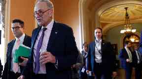 Senate Minority Leader Chuck Schumer (second left) said the bill is 'removed from the reality'.