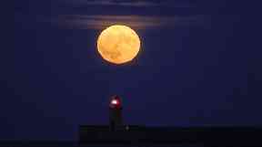 Moon over the lighthouse in South Shields