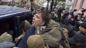 Mikheil Saakashvili is detained by security forces in Kiev.