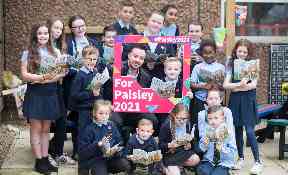 Paisley: Schoolchildren were given a specially commissioned book about the town.
