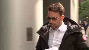 Michael McIndoe arriving at his bankruptcy hearing in June.