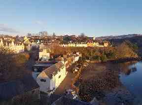 A sunlit Portree in the morning.