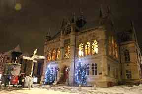 Inverness town house done up in lights.